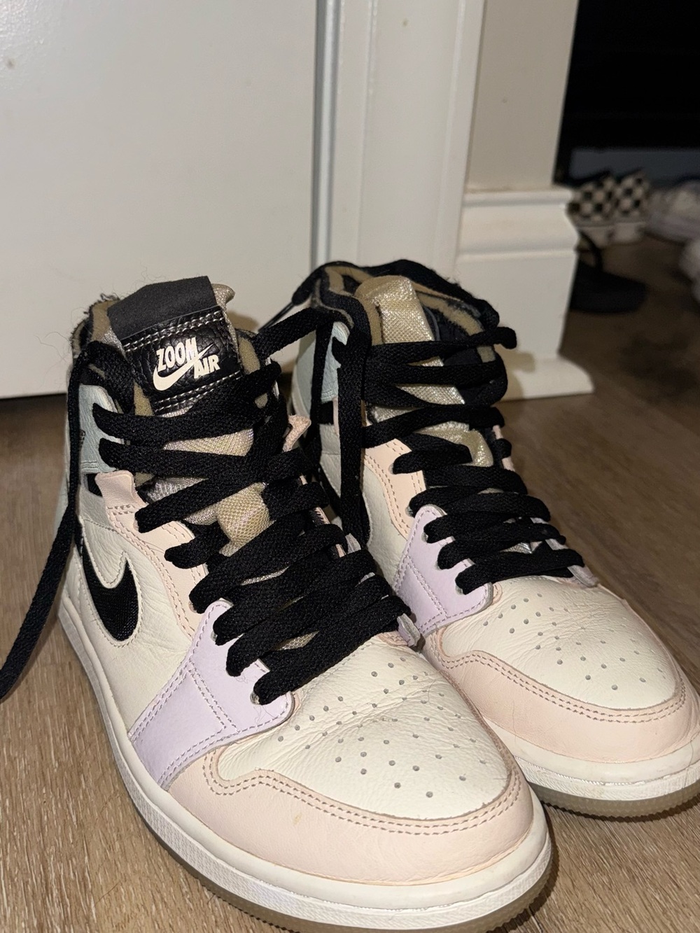 Nike Women’s Pink and Black High-Top Sneakers